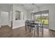 Dining area with slider to backyard and access to kitchen and living spaces at 17537 Sailfin Dr, Orlando, FL 32820
