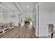 Spacious dining room featuring wood floors, a dining table and easy access to the living room and backyard at 17537 Sailfin Dr, Orlando, FL 32820