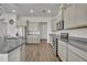 Kitchen features granite countertops, stainless steel appliances, and ample cabinet space at 17537 Sailfin Dr, Orlando, FL 32820