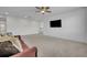 Cozy living room featuring a white accent wall and recessed lighting at 17537 Sailfin Dr, Orlando, FL 32820