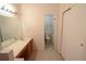 Bathroom featuring a single sink vanity and tile flooring at 1754 Torrington Cir, Longwood, FL 32750