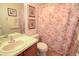 Full bathroom featuring a shower-tub combo with a floral shower curtain at 1754 Torrington Cir, Longwood, FL 32750