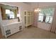 Bright dining room with a charming glass cabinet and a window at 1754 Torrington Cir, Longwood, FL 32750