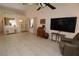 Bright living area with vaulted ceilings, tile flooring, and a large window offering plenty of natural light at 1754 Torrington Cir, Longwood, FL 32750