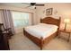Bedroom featuring vaulted ceilings, a ceiling fan, natural light, and a calming decor with neutral accents at 1754 Torrington Cir, Longwood, FL 32750