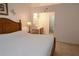 Spacious main bedroom with wood furnishings and connecting bathroom at 1754 Torrington Cir, Longwood, FL 32750
