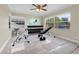 Workout room featuring an exercise bike, weight rack, and workout bench at 181 W Minnehaha Ave, Clermont, FL 34711