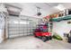 Spacious garage featuring a golf cart and room for storage at 2156 Antilles Club Dr, Kissimmee, FL 34747