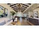 Spacious lounge with high ceilings, elegant lighting fixtures, and comfortable seating arrangements with contemporary artwork at 2156 Antilles Club Dr, Kissimmee, FL 34747