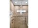 Close up of shower showing tile, multiple shower heads and window for natural light at 2156 Antilles Club Dr, Kissimmee, FL 34747
