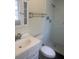 Updated bathroom with modern sink, cabinet, mirror, and walk-in shower featuring chrome fixtures at 2233 N Normandy Blvd, Deltona, FL 32725