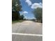 Street view showcasing a quiet neighborhood with well-maintained roads at 2233 N Normandy Blvd, Deltona, FL 32725