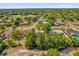 Expansive aerial view of homes in a well-developed residential neighborhood with lush greenery and close proximity to community features at 2357 E Dana Dr, Deltona, FL 32738