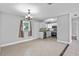 Bright kitchen with white cabinets, stainless appliances, and granite countertops at 245 Amador Cir, Orlando, FL 32810