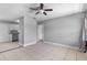 Spacious living room featuring tile flooring and neutral wall colors at 245 Amador Cir, Orlando, FL 32810