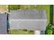 Aerial view showcasing the home's roof structure and surrounding greenery at 245 Amador Cir, Orlando, FL 32810