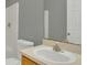 Bathroom featuring light-colored walls, sink with vanity and toilet at 250 Hickory Ave, Orange City, FL 32763