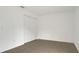 Neutral bedroom featuring tile floors, neutral walls, and large closet for storage at 250 Hickory Ave, Orange City, FL 32763