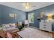Serene secondary bedroom with cozy daybed, lots of light, and neutral decor at 2762 Pepper Ln, Orlando, FL 32812