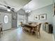 Inviting dining room featuring a vaulted ceiling and traditional style furniture with a view from the window at 293 Drosdick Dr, Casselberry, FL 32707
