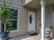 Welcoming front entrance with a decorative door, providing a charming first impression for guests at 293 Drosdick Dr, Casselberry, FL 32707