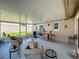 Inviting screened patio offering a relaxing retreat with cozy seating and views of the lush backyard at 293 Drosdick Dr, Casselberry, FL 32707