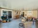 Spacious covered patio area, perfect for outdoor relaxation and entertaining, with comfortable seating at 293 Drosdick Dr, Casselberry, FL 32707