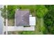 An aerial view of the roof with skylights, and the white carport at 309 Black Springs Ln, Winter Garden, FL 34787