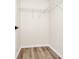 This closet has ample space and built-in shelving for organization at 309 Black Springs Ln, Winter Garden, FL 34787