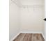 This closet has ample space and built-in shelving for organization at 309 Black Springs Ln, Winter Garden, FL 34787