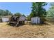A spacious backyard, featuring a dilapidated shack and ample room for recreation or landscaping at 315 Panama Cir, Winter Springs, FL 32708