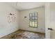 Small bedroom with a window overlooking the exterior; fair condition at 315 Panama Cir, Winter Springs, FL 32708