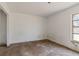 Large bedroom with a window overlooking the exterior of the home at 315 Panama Cir, Winter Springs, FL 32708