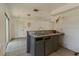 Kitchen area featuring a sink and base cabinets with sliding doors, ready for remodeling at 315 Panama Cir, Winter Springs, FL 32708