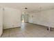 Spacious living room with tile floors and sliding glass doors leading to the backyard at 315 Panama Cir, Winter Springs, FL 32708