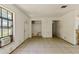 Bright living area with tile floor, closet space, and large window providing natural light at 315 Panama Cir, Winter Springs, FL 32708