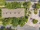 Aerial view of the neighborhood entrance to the community and nearby parking at 3309 Wilshire Way Rd # 3, Orlando, FL 32829