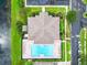 Aerial view showcasing the community pool, surrounding greenery, and well-maintained landscaping at 3309 Wilshire Way Rd # 3, Orlando, FL 32829