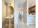 Well-lit powder room featuring a pedestal sink and neutral color scheme at 3309 Wilshire Way Rd # 3, Orlando, FL 32829