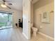 Neat half bathroom with a toilet in view from the living room at 3309 Wilshire Way Rd # 3, Orlando, FL 32829