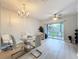 Inviting dining room with modern furniture and access to outdoor patio at 3309 Wilshire Way Rd # 3, Orlando, FL 32829