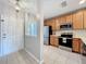 Well-equipped kitchen with stainless steel appliances and light wood cabinetry at 3309 Wilshire Way Rd # 3, Orlando, FL 32829