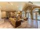 Inviting lounge area with comfortable seating, stylish decor, and access to the pool area at 3309 Wilshire Way Rd # 3, Orlando, FL 32829