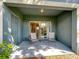 Inviting outdoor patio area with neutral-colored walls is perfect for relaxing or entertaining at 3309 Wilshire Way Rd # 3, Orlando, FL 32829