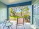 Enjoy outdoor relaxation on the patio with serene views of the community landscaping at 3309 Wilshire Way Rd # 3, Orlando, FL 32829