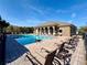 Inviting community pool with lounge chairs and beautifully maintained surroundings, ideal for leisure at 3309 Wilshire Way Rd # 3, Orlando, FL 32829