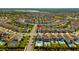 An aerial view of a residential neighborhood, highlighting the home's location at 341 Burma St, Kissimmee, FL 34747
