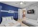 Charming Star Wars-themed bedroom featuring two beds and decor at 341 Burma St, Kissimmee, FL 34747