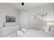 Bright bedroom with a flat-screen TV, mirror decor, and a calm, inviting ambiance at 341 Burma St, Kissimmee, FL 34747
