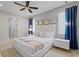 Bright bedroom with natural light, modern furniture, and elegant decor accents at 341 Burma St, Kissimmee, FL 34747